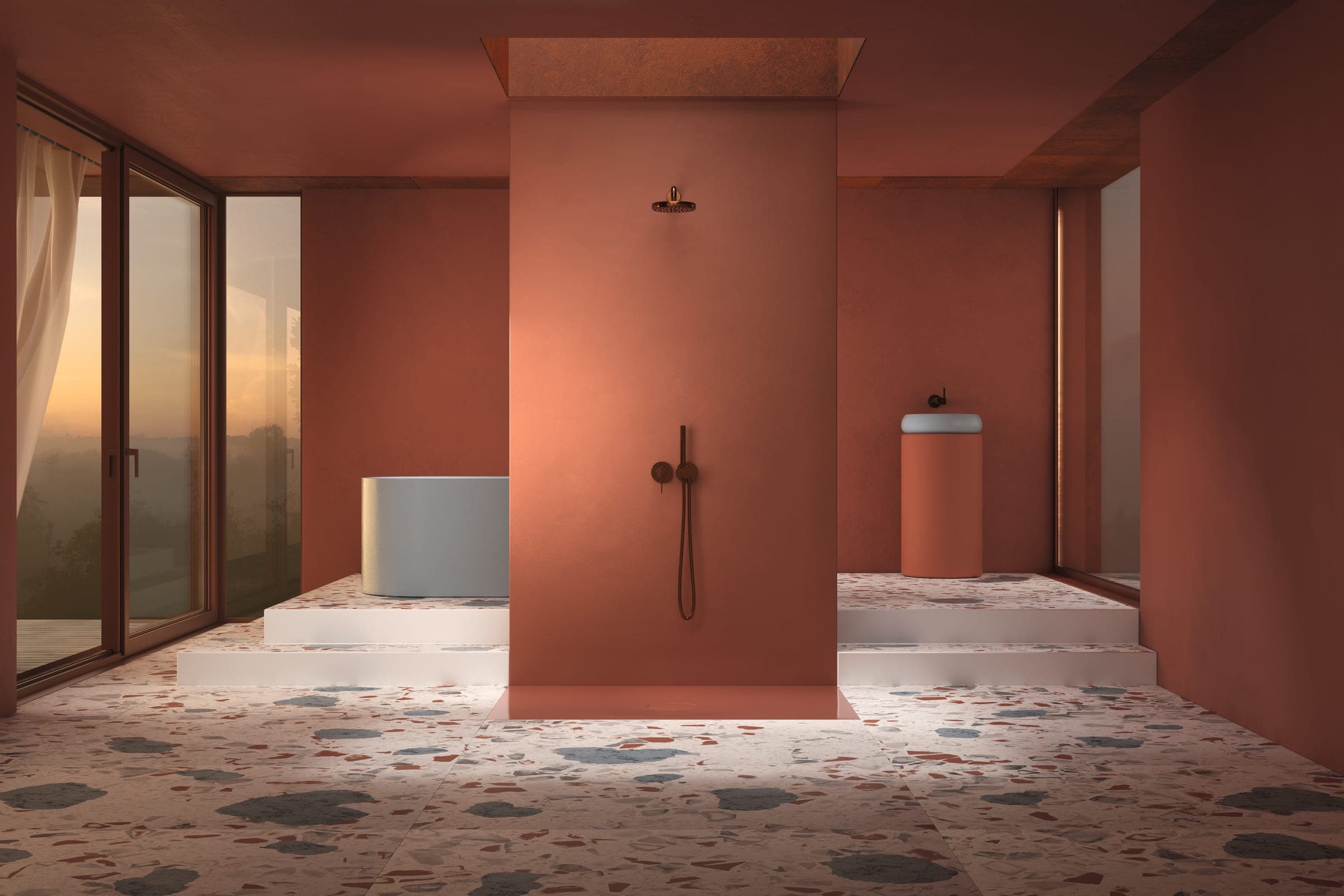 Baño de muros terracota con una columna central que lleva la regadera; a sus pies, una superficie de regadera del mismo tono a ras del piso de terrazo; a los lados, una tina gris claro y un lavabo de pedestal terracota sobre tarimas blancas.