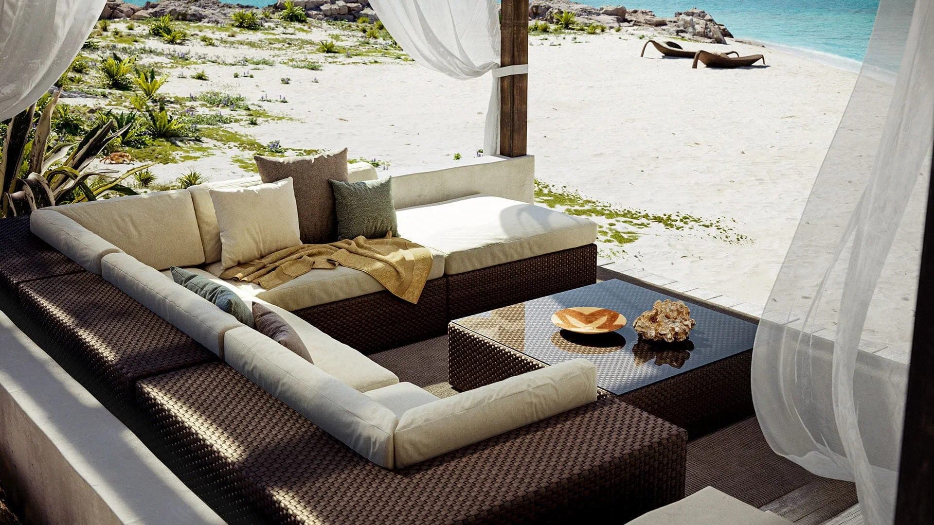 Sala modular tejida bajo una pérgola frente a la playa