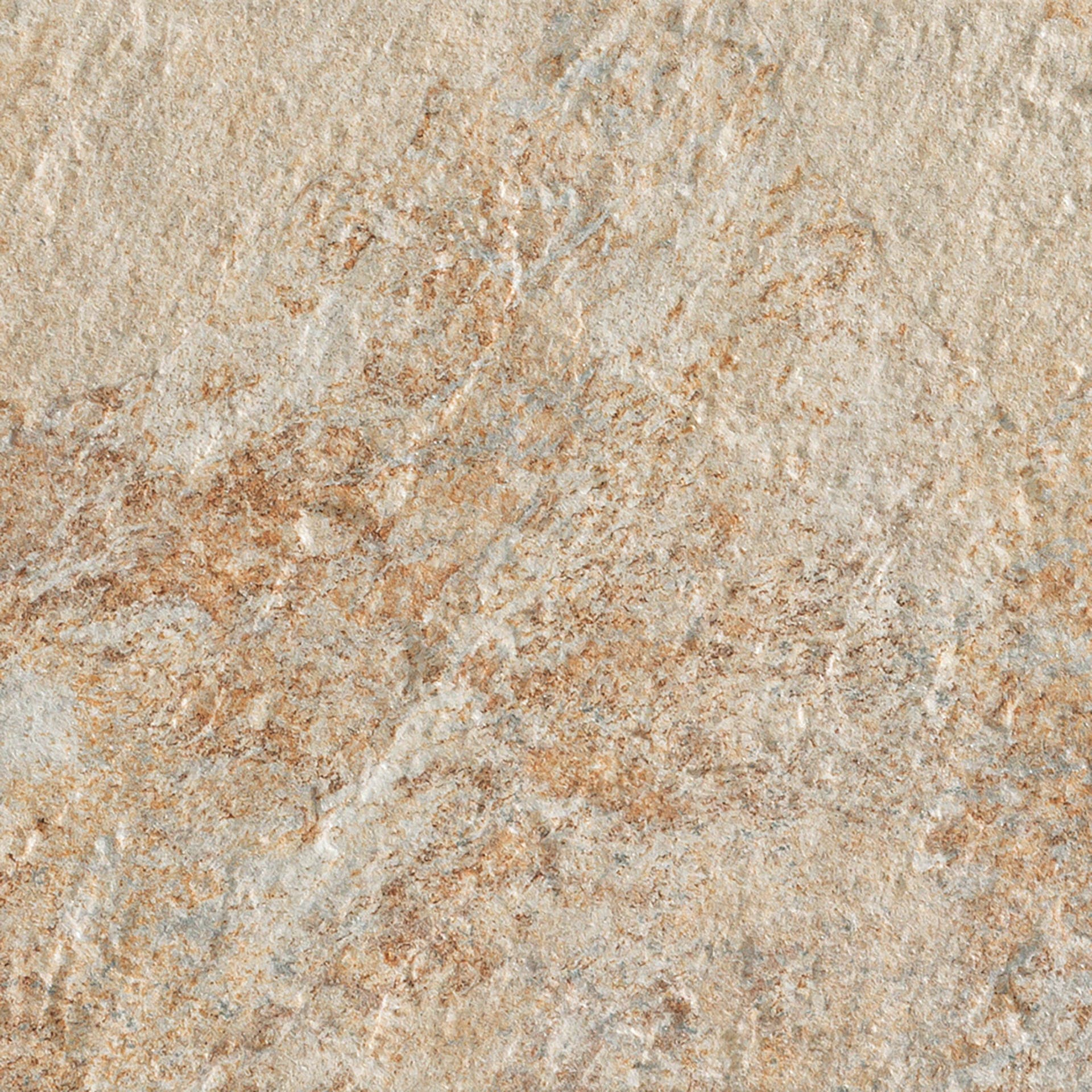 Superficie de porcelanato con textura granulada e irregular de piedra natural, en tonos beige, ocre y gris azulado.